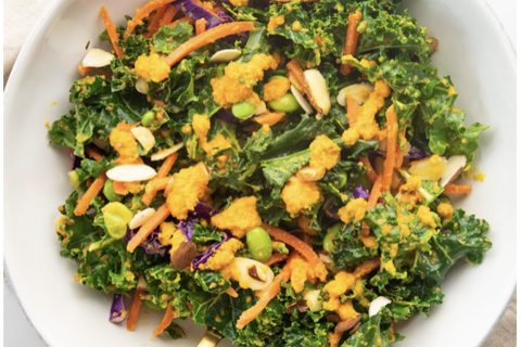 Elevate your lunch with our colourful Asian Kale Salad featuring shredded kale, crisp red cabbage, protein-rich edamame, shredded carrots and toasted almonds. The real star though is our house-made carrot-ginger dressing that brings a bright, colourful, subtly sweet finish to every bite.