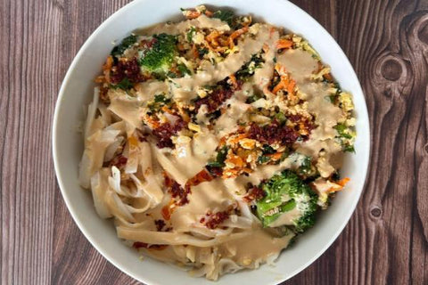 Dan Dan Noodle Bowl with Crumbled Tofu, Napa Cabbage, Fermented Sichuan Daikon, Broccoli, Sesame Dressing and Chili Oil (Limited-Offer/NEW!)