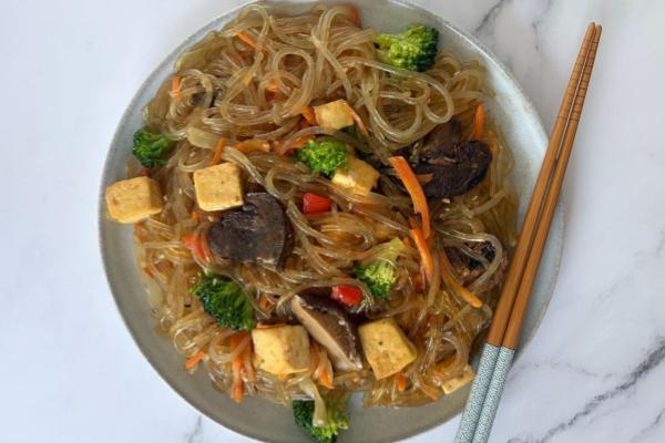 Japchae Bowl with Tofu, Broccoli, Cremini and Shiitake Mushrooms, Red Pepper and Sesame Seeds (Limited Offer!)