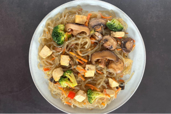 Japchae Bowl with Tofu, Broccoli, Cremini and Shiitake Mushrooms, Red Pepper and Sesame Seeds