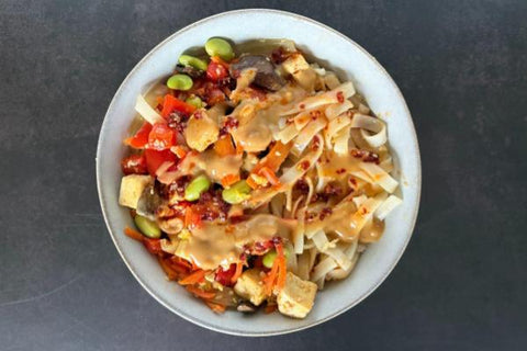 Peanut Noodle Bowl with Tofu, Edamame, Broccoli, Mushrooms, Red Pepper, Napa Cabbage and Chili-Miso Oil (Main 5)