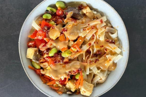 Peanut Noodle Bowl with Tofu, Edamame, Broccoli, Mushrooms, Red Pepper, Napa Cabbage and Chili-Miso Oil (Main 3)
